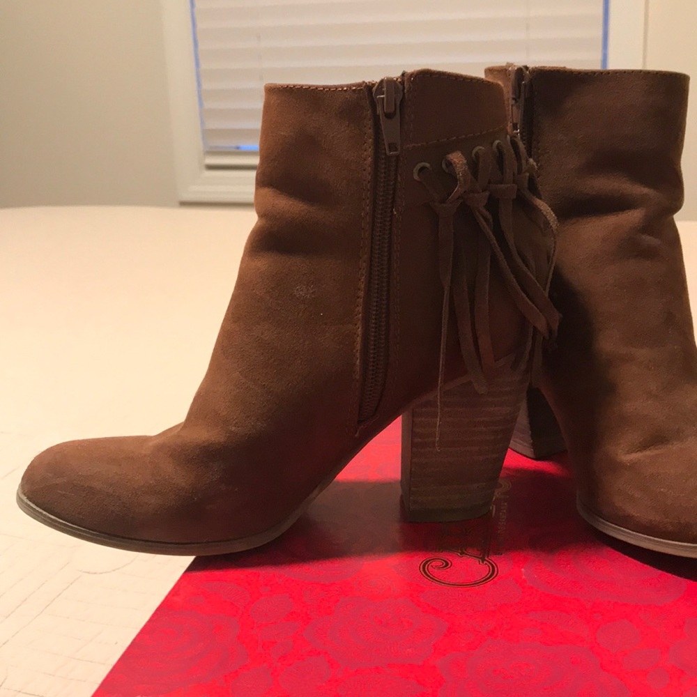Carlos Santana fringe booties.